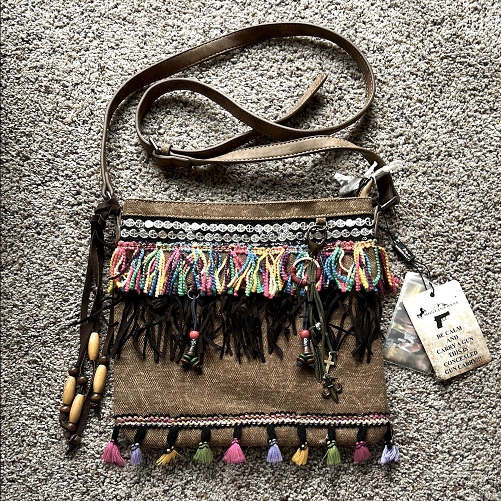 Montana West concealed carry purse new with tags.